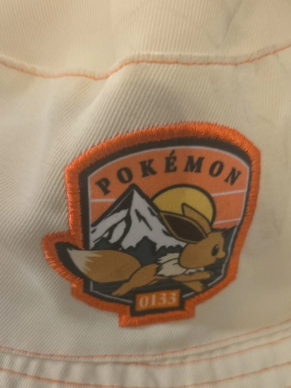 Pokemon Peach & Orange Eevee Patch Bucket Hat